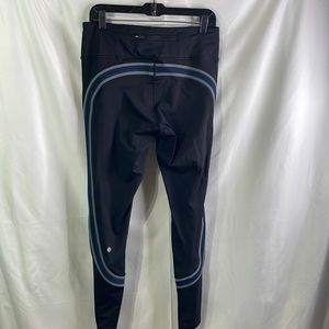 Lululemon black leggings with blue and gray stripes